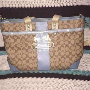 Coach diaper bag with changing pad
